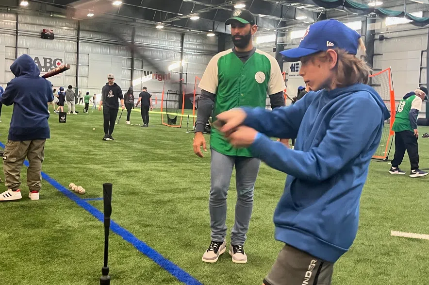Jose Bautista coaches kids at Gordie Howe Sports Complex on Friday