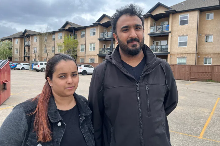 Walid Khalid and Rameesa Nasir woke to an SUV next door, inside their apartment builiding in Lakewood. Lara Fominoff /650 CKOM