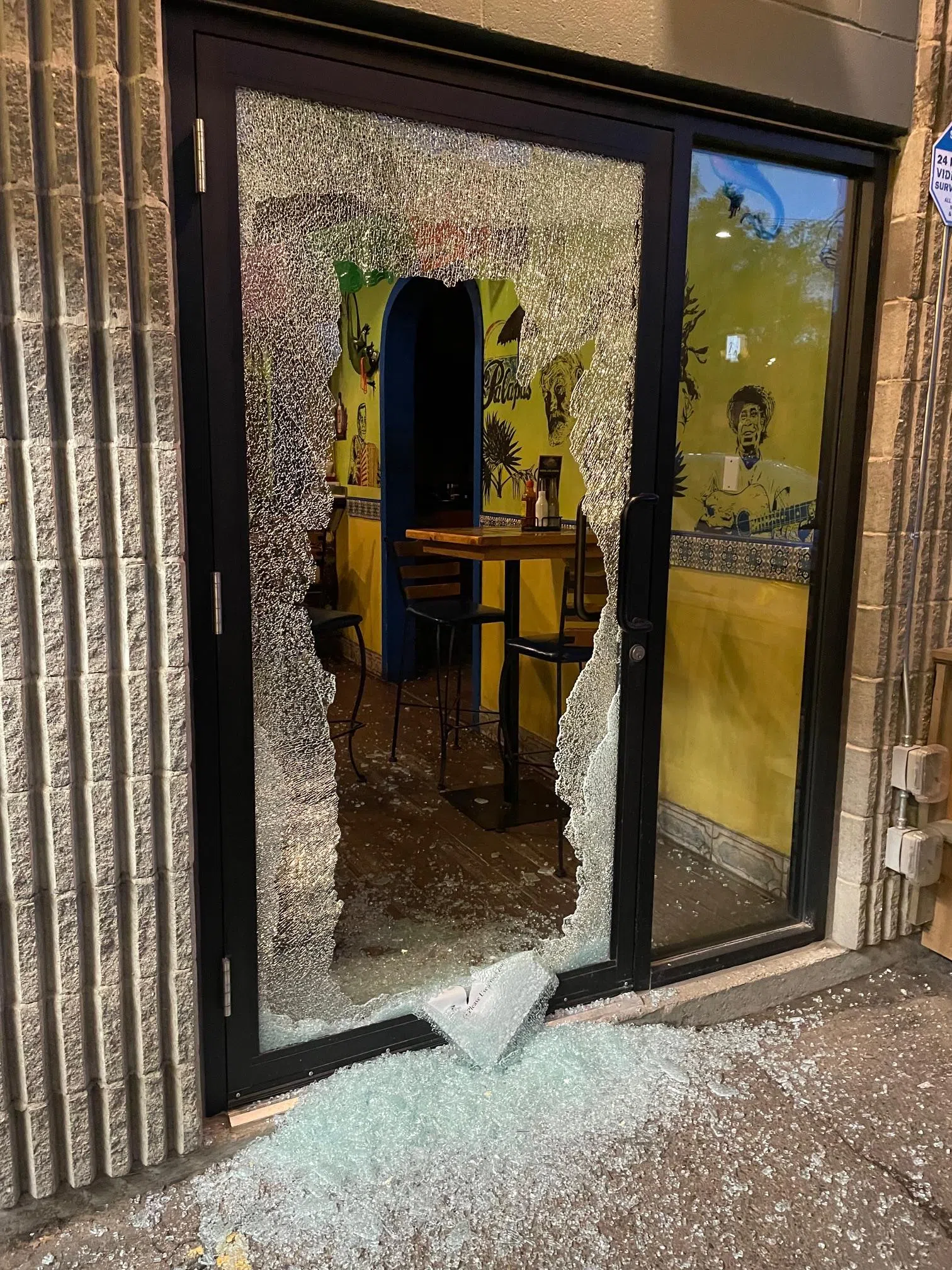 Shattered window at Las Palapas restaurant in Saskatoon. (Submitted)