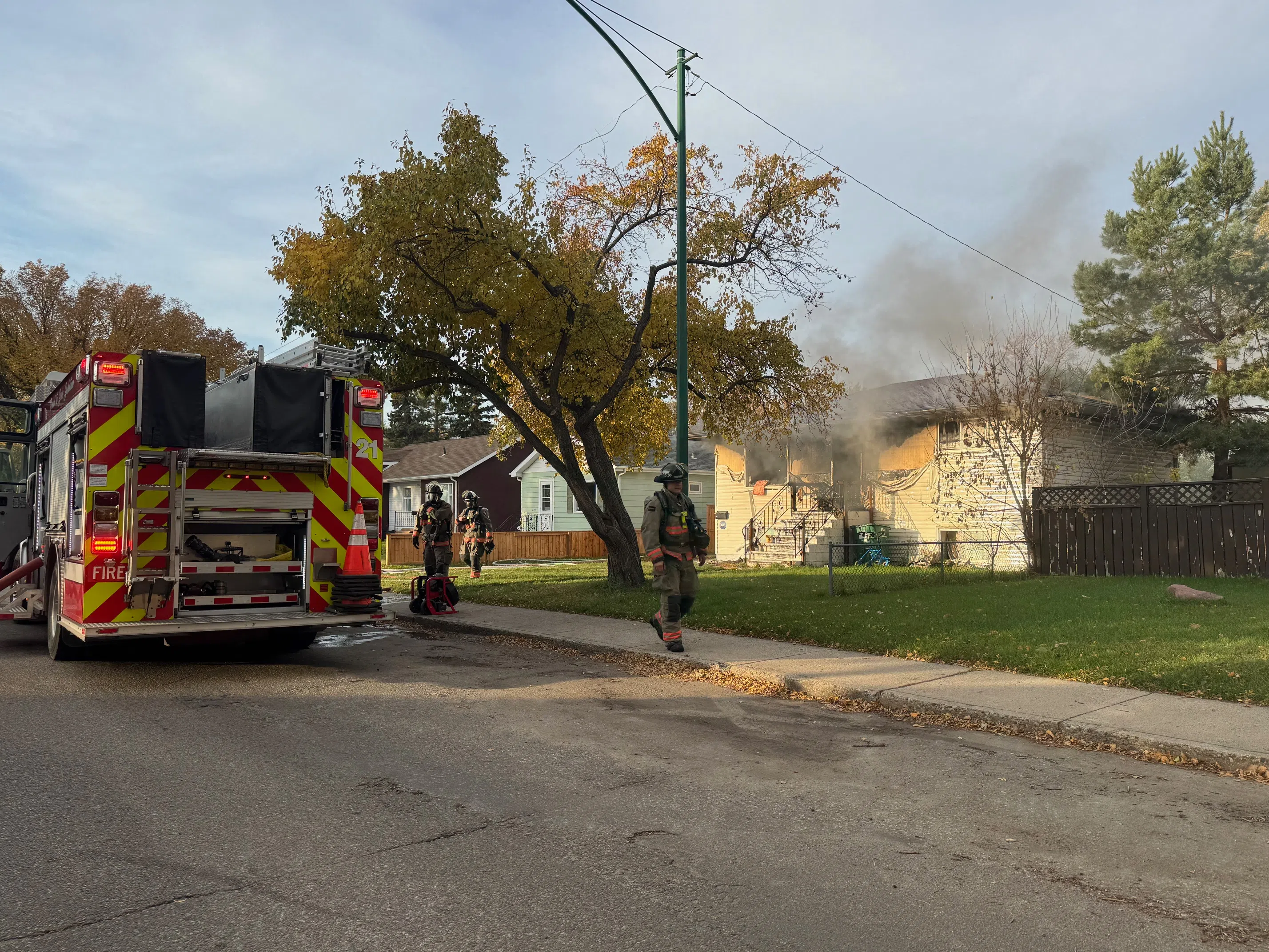 According to a release from the Saskatoon Fire Department, "Crews advanced hose lines to apply water from the exterior of the home." (Alex Brown/650 CKOM)