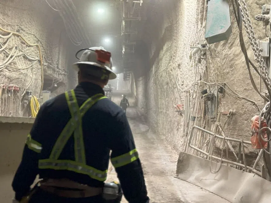 Exiting the shaft, workers are greeted by the dusty pink salty air and have to walk up a little hill to arrive at their vehicles which will take them to their designated work sites. (Céline Grimard/650 CKOM)