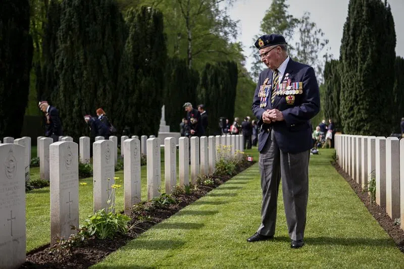 Laird, pictured in 2015 honouring the war dead at the Reichswald Forest War Cemetery in Germany. (Canada Remembers/Facebook)