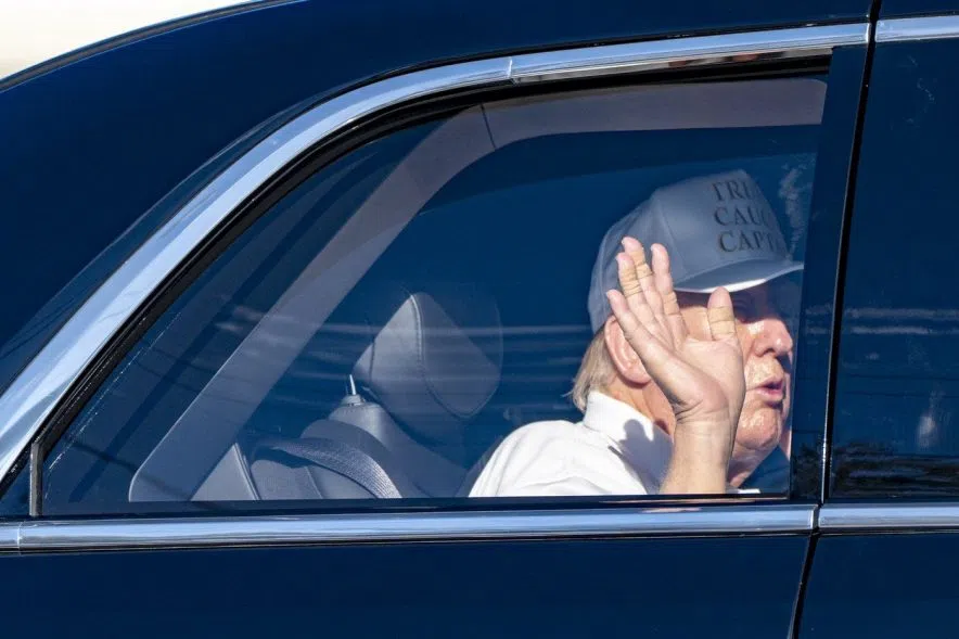 President Donald Trump waves as he arrives at the Trump International Golf Club, in West Palm Beach, Fla., Sunday, March 2, 2025. THE CANADIAN PRESS/AP-Alex Brandon