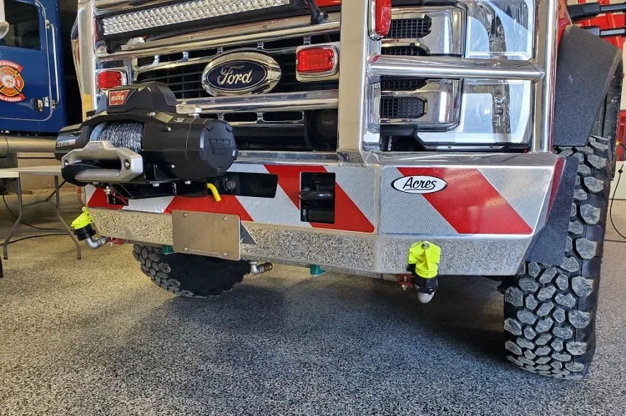 Sprinklers on the bumper of the new fire truck allows the vehicle to driver over the fire while extinguishing it.