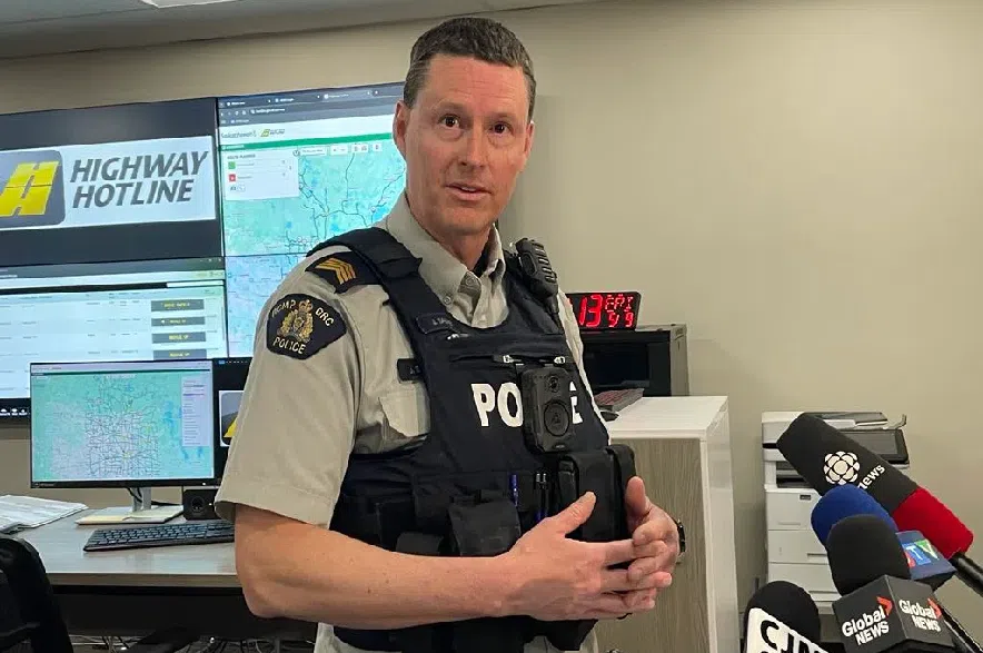 RCMP staff sergeant Jason Sauve speaking to reporters.