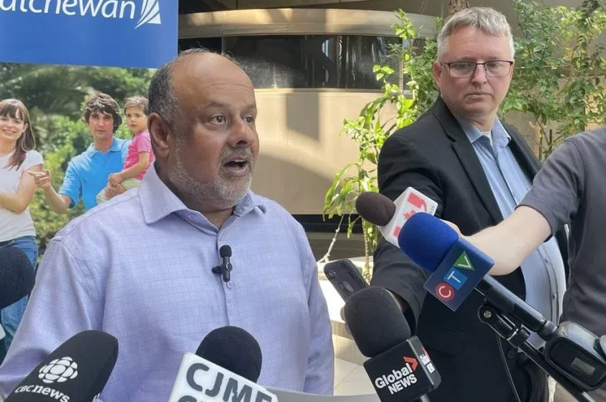Dr. Saqib Shahab speaking to reporters in Regina.