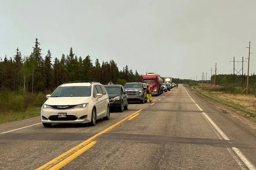 Vehicles line up to evacuate La Ronge.