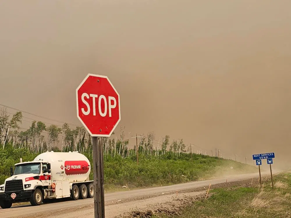 A smoke filled sky near Sucker River, a community forced to evacuate Monday due to wildfires. (La Ronge Regional Fire Dept. / Facebook)