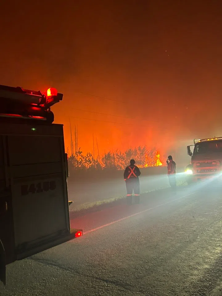 Crews from Wakaw/Hoodoo Fire and Rescue are providing structural protection in the hamlet of Weyakwin. (Wakaw/Hoodoo Fire and Rescue/Facebook)