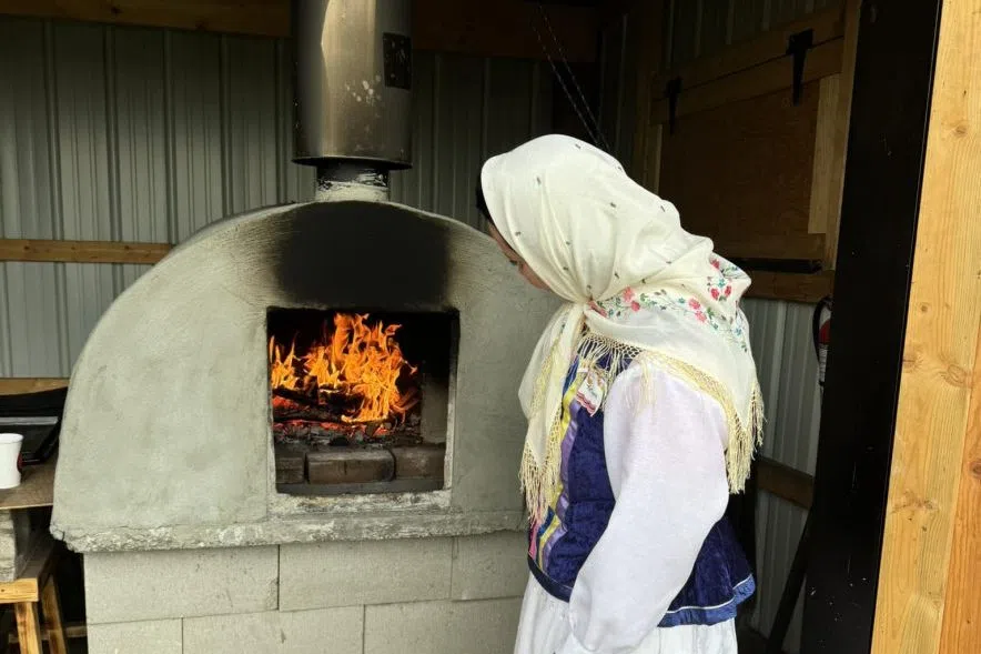 Brenda with her Dads bread oven