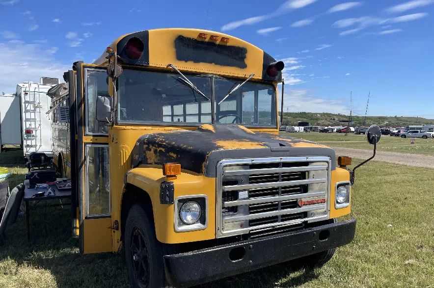 A yellow school bus at the Country Thunder festival.