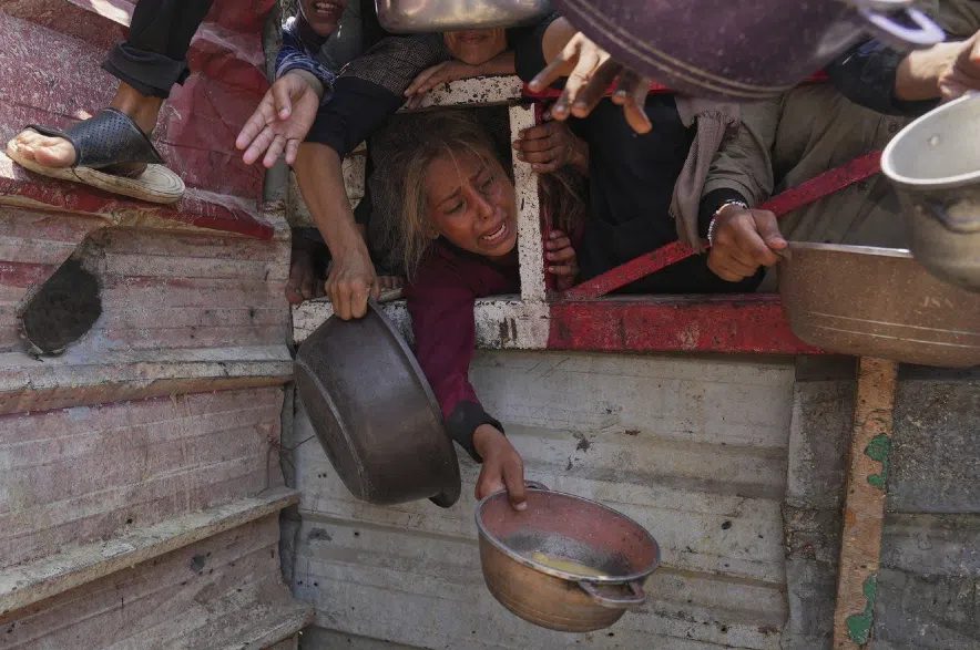 Palestinians struggle to get donated food.