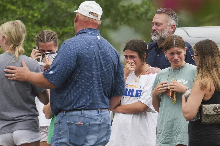 People grieving in Texas after flooding.