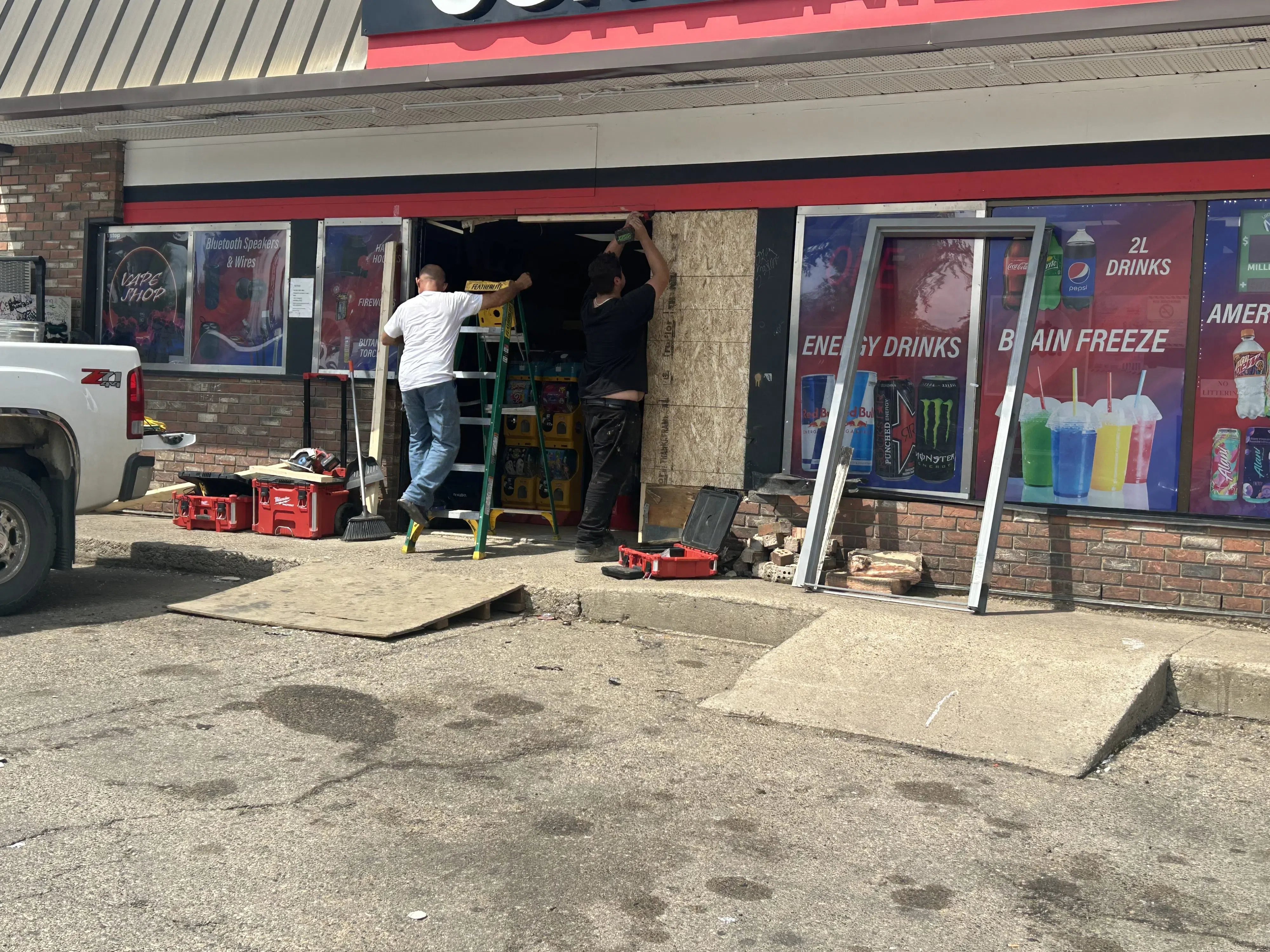 Damages to the front of a convenience store after it was hit by a vehicle on July 9, 2025. (Shane Clausing/650 CKOM)