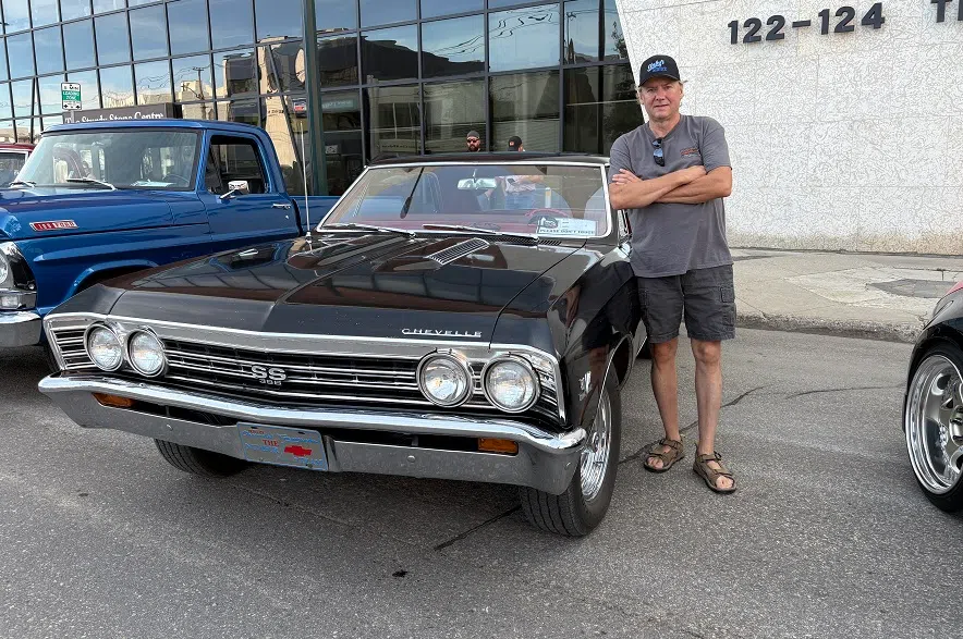 Grant Pippen next to his 1967 Chevelle.