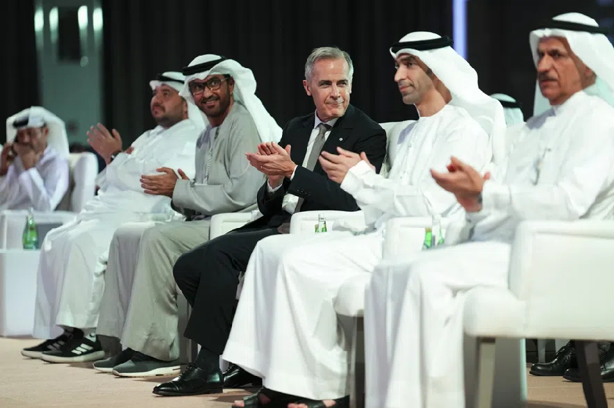 Prime Minister Mark Carney takes part in the Canada-UAE Investment Summit in Abu Dhabi on Friday, Nov. 21, 2025.