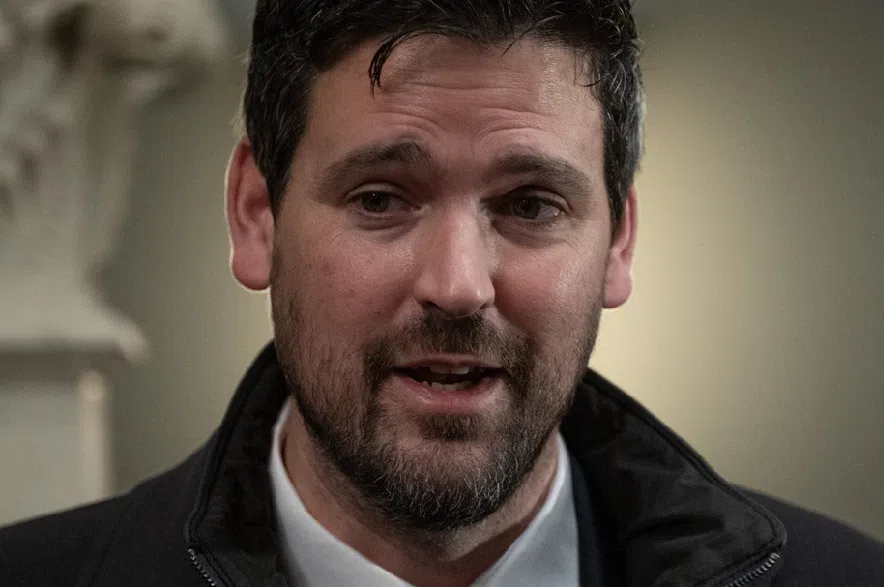 Minister of Justice Sean Fraser speaks with reporters before caucus on Parliament Hill, in Ottawa, Wednesday, Nov. 19, 2025.