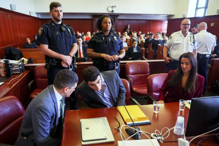 Luigi Mangione appears in Manhattan Criminal Court, Monday, Dec. 8, 2025, in New York.