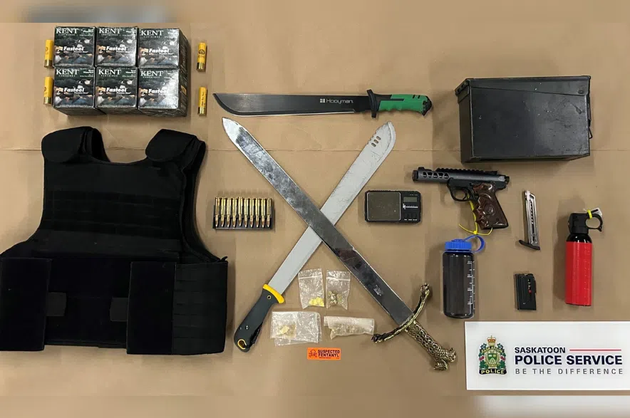 Saskatoon's Crime Reduction Team seized a number of items from a home in the 100 block of St. Paul's Place, inclduing 19.4 grams of yellow/grey fentanyl, $364 in cash, ammunition and bear spray. (Saskatoon Police Service/Submitted)