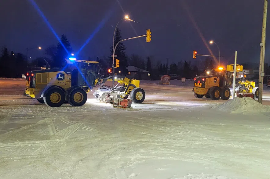 Graders working on Saskatoon streets in December, 2025.