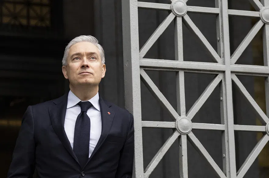 Minister of Finance Francois-Philippe Champagne poses outside the ministry's offices, in Montreal, on Friday, Dec. 19, 2025.