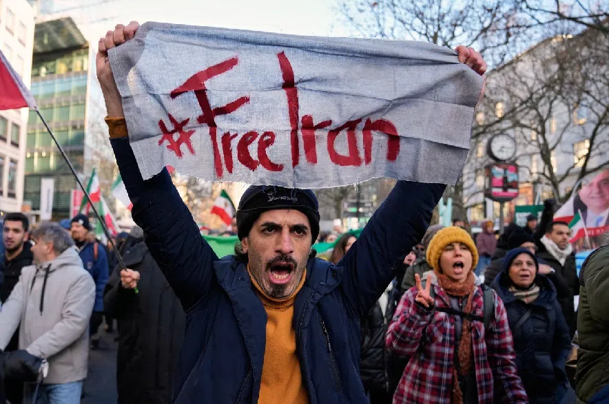 Protesters participate in a demonstration in Berlin in support of the nationwide mass protests in Iran against the government on Saturday, Jan. 10, 2026.