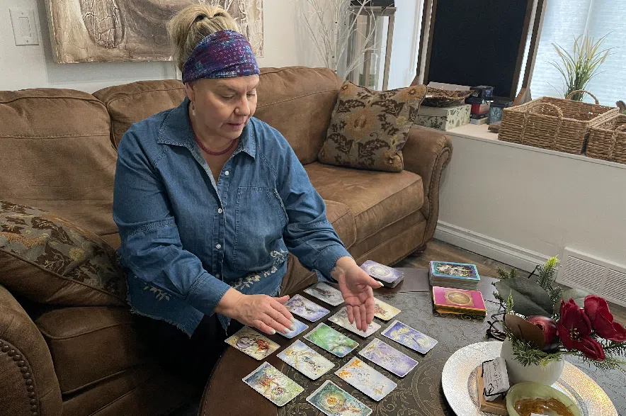 Sherry Crawford reading tarot cards.