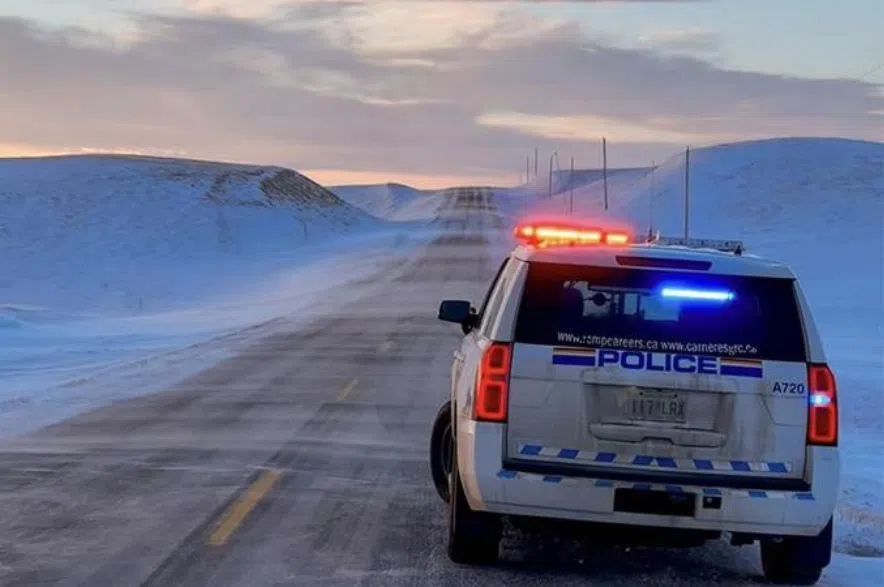 police vehicle parked on highway, Saskatchewan RCMP credit