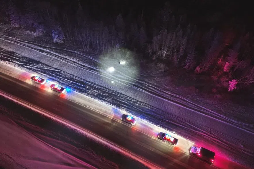 The RCMP used the lights on their vehicles and sirens as additional guidance tools to help the missing man get out of the forest. (Prince Albert RCMP/Submitted)