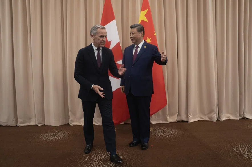 Mark Carney and Xi Jinping.