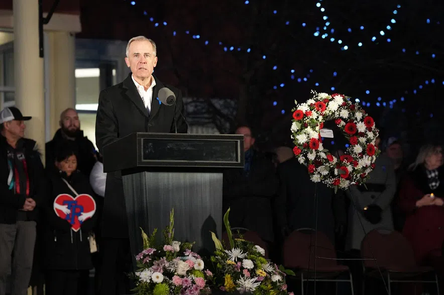 Prime Minister Mark Carney speaks while attending a vigil for the victims of a mass shooting, in Tumbler Ridge, B.C., Friday, Feb. 13, 2026.
