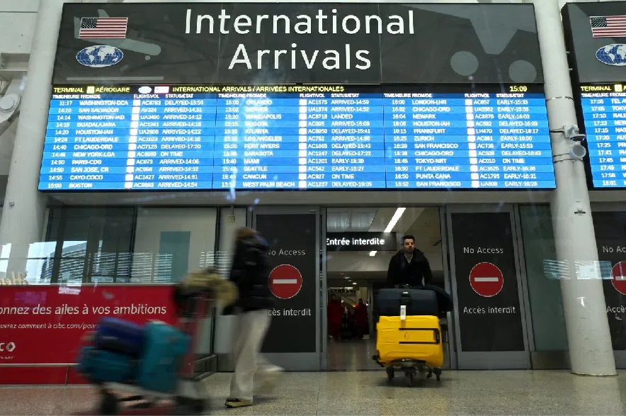 International passengers arrive at Pearson International Airport in Toronto, Ont. on Wednesday, Feb.11, 2026. US sanctions against oil getting to Cuba has caused jet fuel shortages and flight delays from the Caribbean nation.