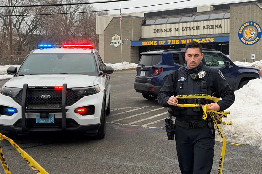 Police continue to tape off the Dennis M. Lynch arena a day after a deadly shooting during a youth hockey game on Tuesday, Feb. 17, 2026 in Pawtucket, R.I.