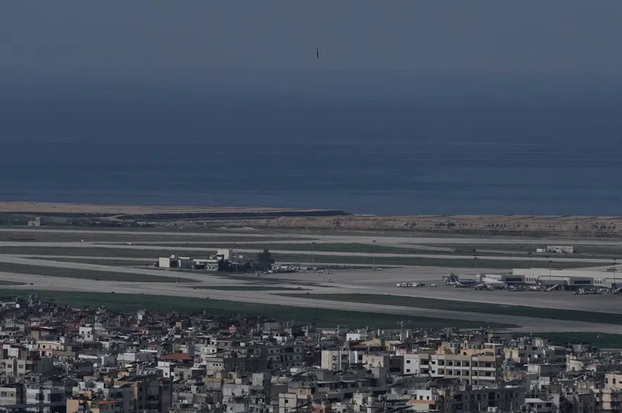 A bomb dropped from an Israeli jet falls before hitting a building in Dahiyeh, southern suburb of Beirut, near Rafik Hariri International Airport, Lebanon, Wednesday, March 4, 2026.