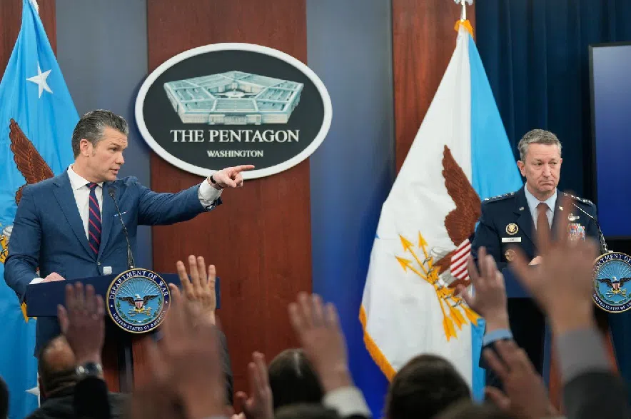 Defense Secretary Pete Hegseth and Chairman of the Joint Chiefs of Staff Gen. Dan Caine take questions during a press briefing at the Pentagon, Monday, March 2, 2026, in Washington.