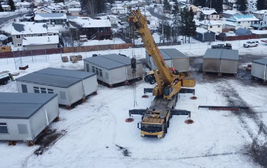 Portable school buildings are seen during installation on the grounds of Tumbler Ridge Elementary School in Tumbler Ridge, B.C., in this undated handout image posted on social media by B.C. Infrastructure Minister Bowinn Ma.