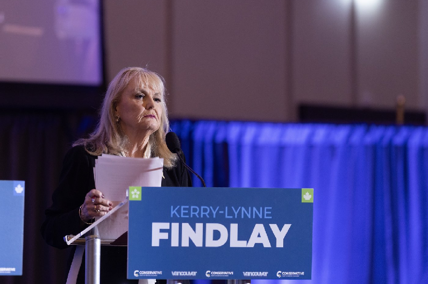 B.C. Conservative leadership candidate Kerry-Lynne Findlay looks on during a debate at the Canada Strong and Free Network conference in Vancouver on Friday, April 24, 2026. Findlay went on to win the leadership contest but resigned on Sunday after weeks of upheaval in the caucus.