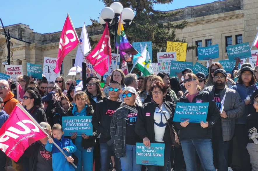 CUPE health-care workers rally outside the Saskatchewan Legislative Assembly in July of 2025.