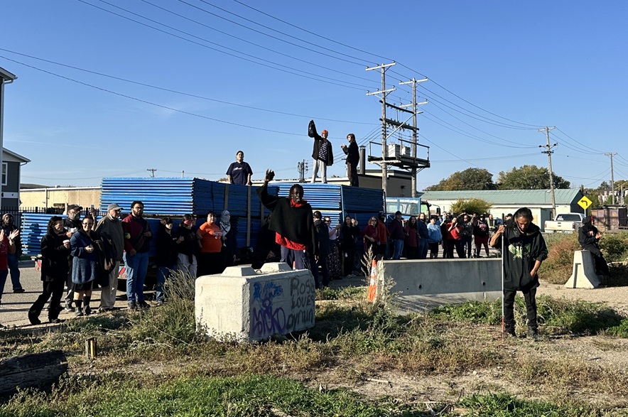 Protestors show support for the residents of the encampment located at Avenue K South and 20th Street west