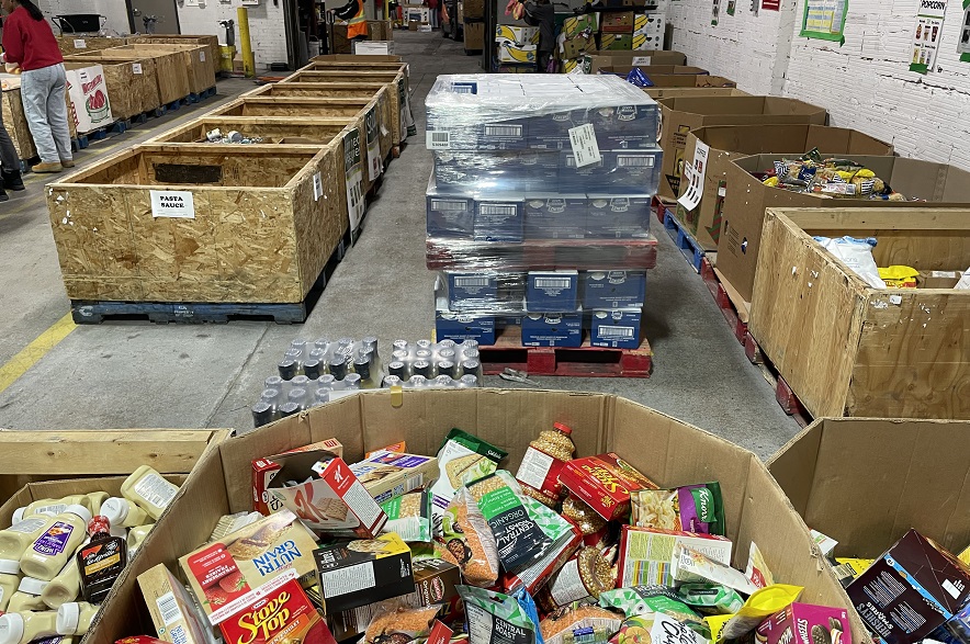 Bins of food and crates at the Saskatoon Food Bank.