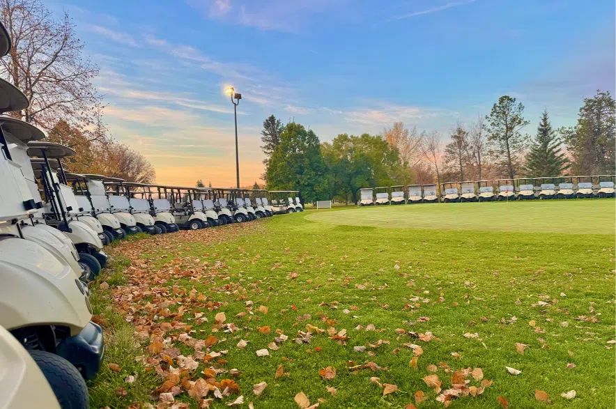 Golf carts lined up at Holiday Park Golf Course in Saskatoon.
