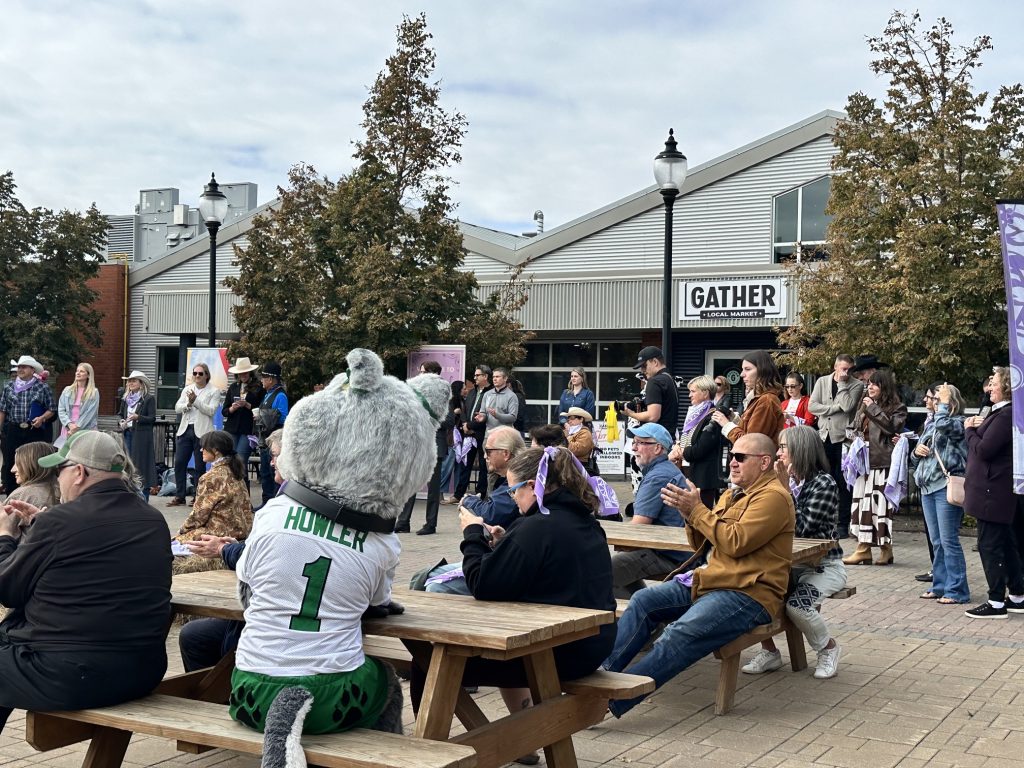 Many people in the crowd gathered at Gather Local Market to celebrate the kick off to the Canadian Country Music Awards' Country Music Week 2026 were wearing or holding Chris Chipak's bandanas on Sept. 15, 2026. (Libby Gray/650 CKOM)