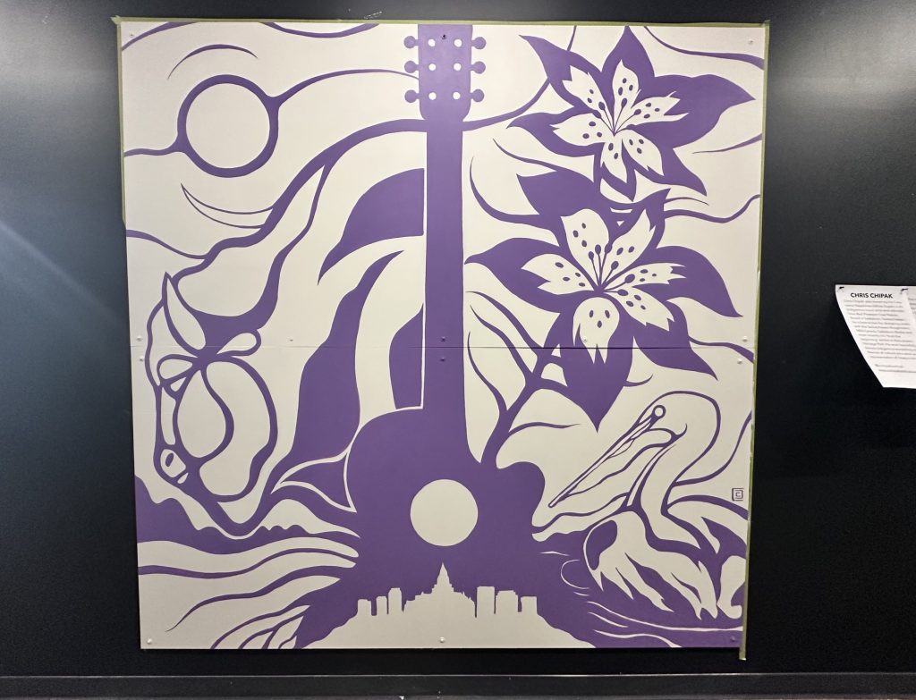 Chris Chipak's completed mural for the Canadian Country Music Awards, displayed in Gather Local Market on Sept. 16, 2026. (Libby Gray/650 CKOM)