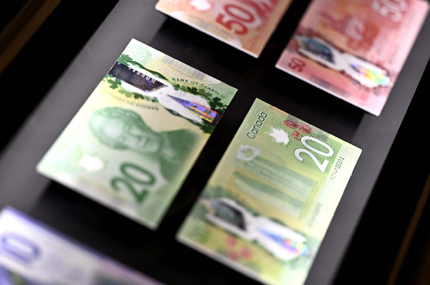 Bank notes issued by the Bank of Canada are seen in a display case at the Bank of Canada Museum in Ottawa, on Wednesday, Sept. 4, 2024.