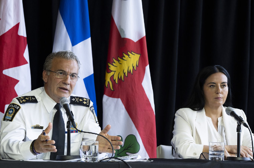 Montreal police chief Fady Dagher and Montreal Mayor Soraya Martinez Ferrada announce that the police will be equipped with body cameras during a press conference in Montreal on Friday, Aug. 21, 2026.