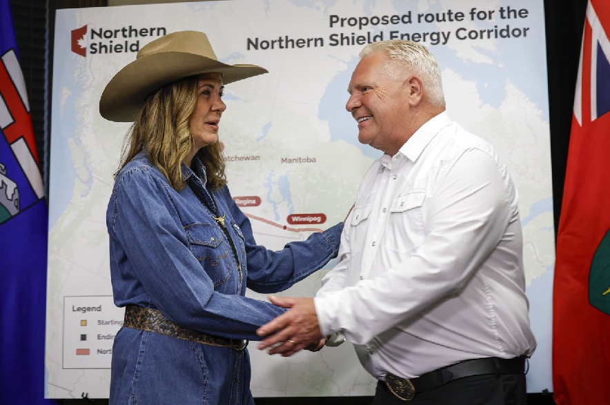 Alberta Premier Danielle Smith, left, and Ontario Premier Doug Ford pose with a map of the Northern Shield pipeline proposal in Calgary on Monday, July 6, 2026.
