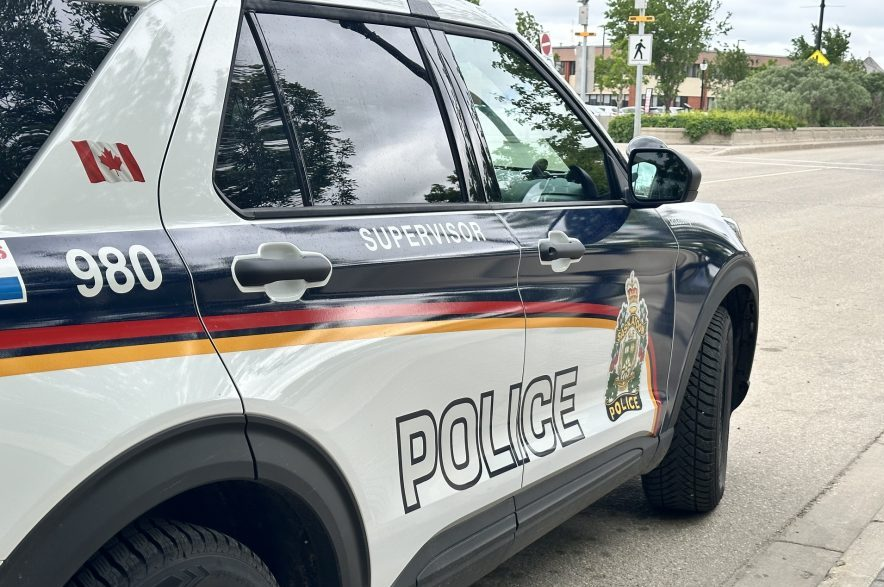 A Saskatoon police SUV parked on the street.