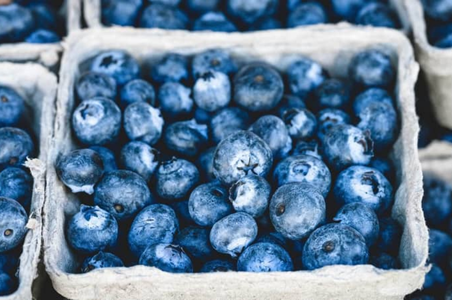 Stacked boxes of blueberries.