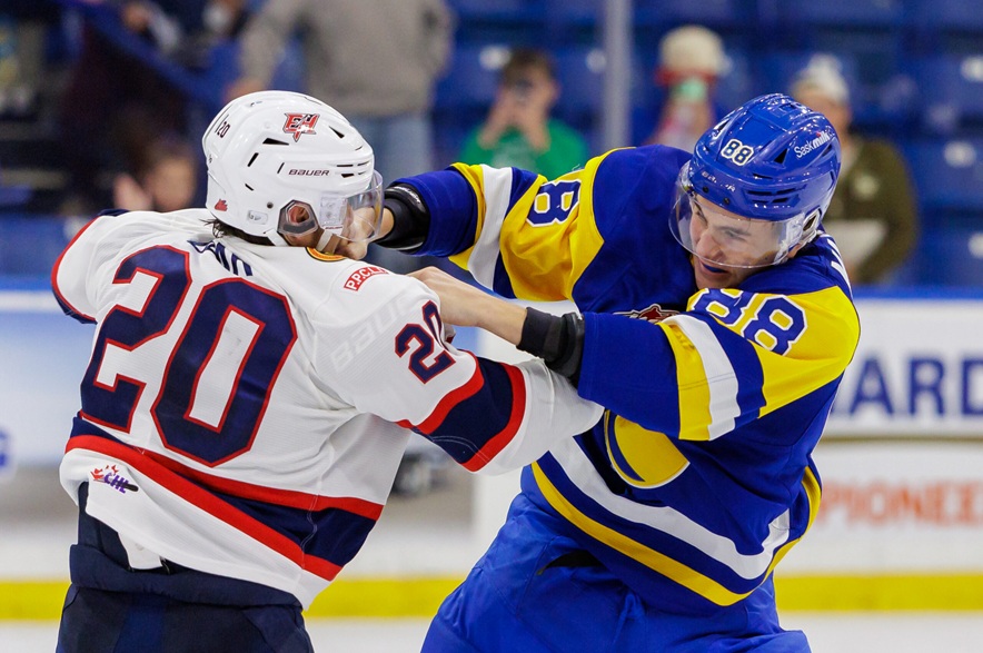 Saskatoon Blades forward Kain Martinuik (right) dropped the gloves with Regina Pats forward Connor Bear in his first WHL regular-season fight on Oct. 10, 2026.