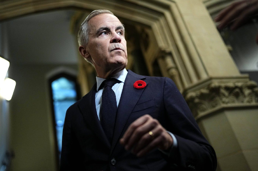 Prime Minister Mark Carney speaks before a meeting of the Liberal caucus on Parliament Hill in Ottawa on Wednesday, Oct. 28, 2026.
